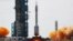 The Long March-2F Y12 rocket, carrying the Shenzhou-12 spacecraft and three astronauts, takes off from Jiuquan Satellite Launch Center for China's first manned mission to build its space station, near Jiuquan, Gansu province, China June 17, 2021. 