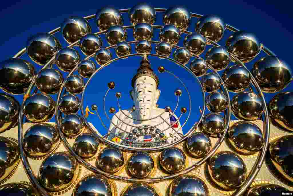 The big Buddha statues are seen at Wat Phra That Pha Sorn Kaew temple, Khao Kho district, Phetchabun province, Thailand.