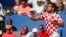 Marin Cilic of Croatia returns a shot to Sam Querrey of the United State during their Davis Cup semifinal singles match in Zadar, Croatia, Sept. 16, 2018. 