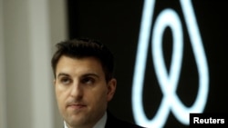 FILE - Brian Chesky, CEO and co-founder of Airbnb, speaks to the Economic Club of New York at a luncheon at the New York Stock Exchange (NYSE) in New York, March 13, 2017. 