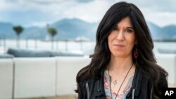 FILE - Director Debra Granik poses for portrait photographs for the film "Leave No Trace," at the 71st international film festival, Cannes, southern France, May 14, 2018.