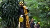 Military personnel carries diving cables out from Tham Luang cave complex, as members of an under-16 soccer team and their coach have been found alive according to local media in the northern province of Chiang Rai, Thailand.