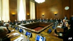 United Nations Special Envoy for Syria Staffan de Mistura, second from right, meets with Russian foreign minister Sergei Lavrov, Turkish foreign minister Mevlut Cavusoglu and Iranian foreign minister Mohammad Javad Zarif in Geneva, Switzerland, Dec. 18, 2018. 