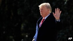 FILE - President Donald Trump waves as he leaves the White House in Washington, Feb. 2, 2018, en route to the Customs and Border Protection National Targeting Center in Sterling, Virginia. 