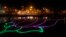 An illumination in the shape of a lotus, party symbol of the winning Bharatiya Janata Party, illuminates the River Ganges in Varanasi, in the northern Indian state of Uttar Pradesh, May 16, 2014.