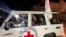 A vehicle carrying hostages abducted by Hamas militants during the October 7 attack on Israel arrives at the Rafah border