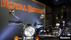 FILE - Royal Enfield motorcycles are displayed at Royal Enfield's flagship shore in Bangkok, Thailand, Feb. 24, 2016. 