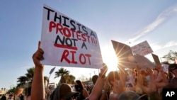 Protesters rally, June 2, 2020, in Phoenix during demonstrations over the death of George Floyd, a black man who died after being restrained by Minneapolis police officers on May 25. 