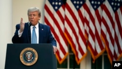 President Donald Trump speaks at a news conference in the Rose Garden of the White House in Washington, April 15, 2020.