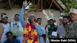 Jamaat-e-Islami-backed candidate Sayar Ahmed Reshi addresses an election campaign rally at Kulgam district in south Kashmir, Sept. 13, 2024. 