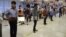 Indian students line up at American Embassy in New Delhi for student visas, June 19, 2014. (Anjana Pasricha/VOA)