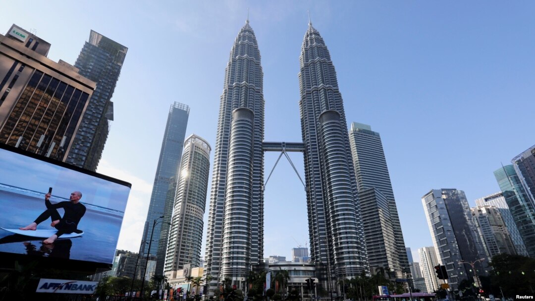 FILE - Roads are deserted during a lockdown due to the coronavirus outbreak, in Kuala Lumpur, Malaysia, June 1, 2021. 