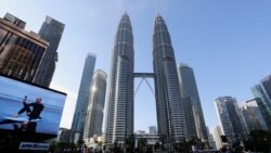 FILE - Roads are deserted during a lockdown due to the coronavirus outbreak, in Kuala Lumpur, Malaysia, June 1, 2021.