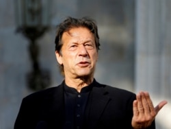 FILE - Pakistan's Prime Minister Imran Khan speaks during a joint news conference with Afghan President Ashraf Ghani (not pictured) at the presidential palace in Kabul, Afghanistan, Nov. 19, 2020.