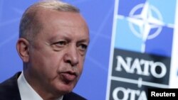 თურქეთის პრეზიდენტი რეჯებ ტაიპ ერდოღანი ნატოს სამიტზე გამოსვლისას. ბრიუსელი, ბელგია. 14 ივნისი, 2021 წ.