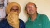 Undated handout photo with unknown dateline supplied by the Gerardmer-Tidarmene association shows Pierre Camatte (R), 61, posing with an unidentified man. Camatte was kidnapped overnight on 25 Nov 2009 in Menaka, northern Mali.