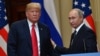 Presiden AS Donald Trump (kiri) dan Presiden Rusia Vladimir Putin meninggalkan kantor setelah konferensi pers bersama setelah pertemuan di Istana Kepresidenan di Helsinki, pada 16 Juli 2018. (Foto: AFP)