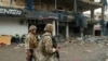 Lebanese army soldiers secure the area outside a building that was targeted in an Israeli airstrike in Beirut's southern suburbs on November 2, 2024, amid the ongoing war between Israel and Hezbollah.