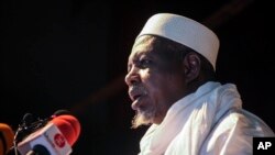 FILE — Mahmoud Dicko, an imam who helped lead the opposition protests, leads a prayer service for those who died or were injured during the protests, in Bamako, Mali August 28, 2020.