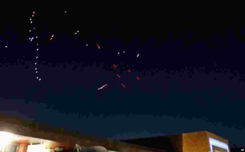 The Libyan army fires anti-aircraft missiles during air strikes by coalition forces in Tripoli, March 20, 2011. (Reuters/Zohra Bensemra)