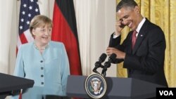 Presiden Barack Obama dan Kanselir Jerman Angela Merkel dalam konferensi pers bersama di Gedung Putih, Selasa (7/6).