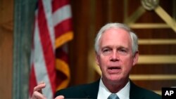 FILE - Sen. Ron Johnson, speaks during a Senate Homeland Security Committee hearing, defending his committee's investigation into Ukraine and Joe Biden from criticism that his probe is politically motivated and advancing Russian interests, Aug. 6, 2020.