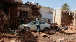 Rescuers search for bodies in Libya's flood wrecked city of Derna, Sept. 21, 2023.