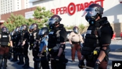Minnesota State Police protect a Target Store, May 28, 2020, in St. Paul, Minn. 