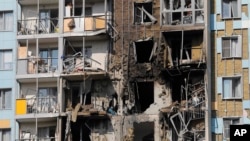 A view of the site of the damaged multi-story residential building following an alleged Ukrainian drone attack in Ramenskoye, outside Moscow, Moscow region, Russia, on Sept. 10, 2024.