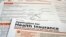 FILE - A draft copy of the 21-page of a Health and Human Services Department form proposed for use to apply for low-cost insurance from Medicaid or the Children's Health Insurance Program is photographed in Washington, March 12, 2013. 