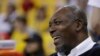 FILE - Hakeem Olajuwon, a former college athlete from Nigeria and a Houston Rockets player, smiles before Game 6 of the NBA basketball Western Conference Finals in Oakland, Calif., May 26, 2018.