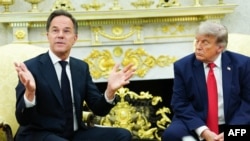 US President Donald Trump meets with NATO Secretary General Mark Rutte in the Oval Office of the White House in Washington, DC, on June 24, 2026. (Photo by Aaron Schwartz / AFP)