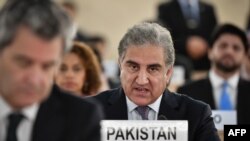 Menteri Luar Negeri Pakistan Shah Mehmood Qureshi berpidato di depan Dewan Hak Asasi Manusia PBB pada 10 September 2019 di Jenewa. (Foto: AFP/Fabrice Coffrini)