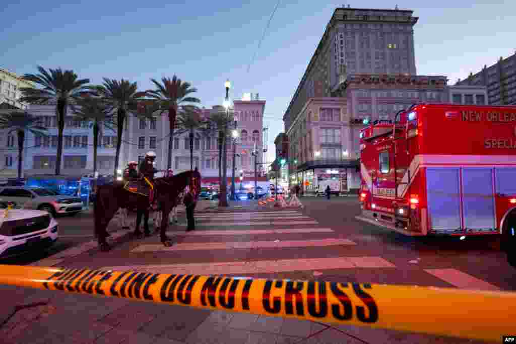 Police cordon off the intersection of Canal Street and Bourbon Street in the French Quarter of New Orleans, Jan. 1, 2025.