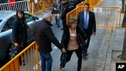 Ex-speaker of the Catalonia parliament Carme Forcadell, front right, arrives at the Spain's Supreme Court in Madrid, Nov. 9, 2017. 