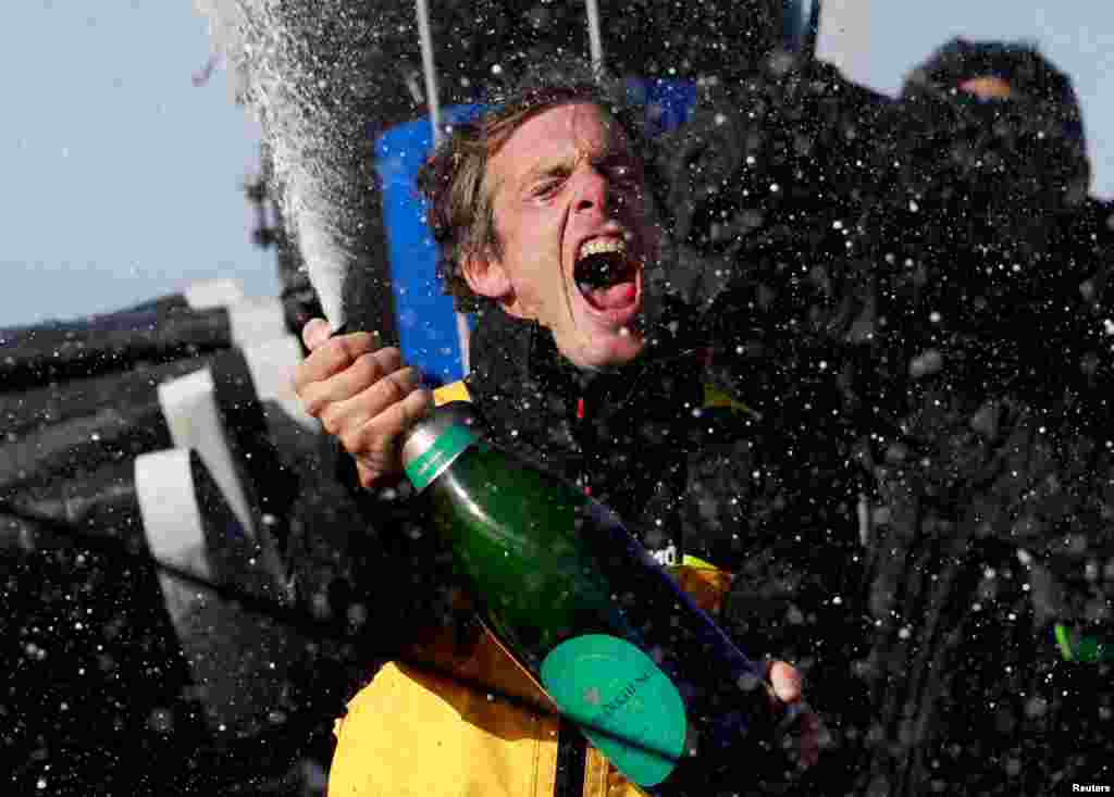 Macif Sante Prevoyance&#39;s Charlie Dalin celebrates after winning the Vendee Globe sailing competition in Les Sables-d&#39;Olonne, France.