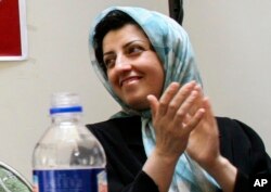 FILE - Prominent Iranian human rights activist Narges Mohammadi is seen in a meeting on women's rights in Tehran, Iran, on July 3, 2008.