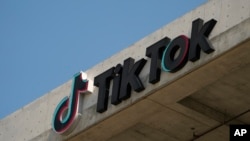 FILE - The TikTok logo is seen on the company's building in Culver City, California, on March 11, 2024. Thirteen U.S. states and the District of Columbia sued TikTok on Oct. 8, 2024, accusing it of harming young people.