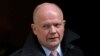 Britain's Foreign Secretary William Hague leaves after attending a Cabinet meeting at Number 10 Downing Street in London, March 12, 2013. 