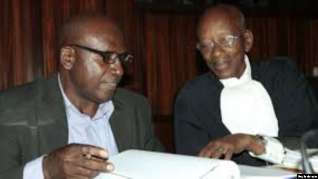 Prof. Runyinya Barabwiriza n'umwunganira Me Protais Mutembe