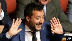 FILE - Matteo Salvini, Italy's interior minister and deputy premier and head of the Lega Party, addresses the Senate in Rome, Aug. 13, 2019.