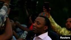 Former presidential candidate Omoyele Sowore talks to the media after being released on bail by Nigeria's government, in Abuja, Nigeria, Dec. 24, 2019.