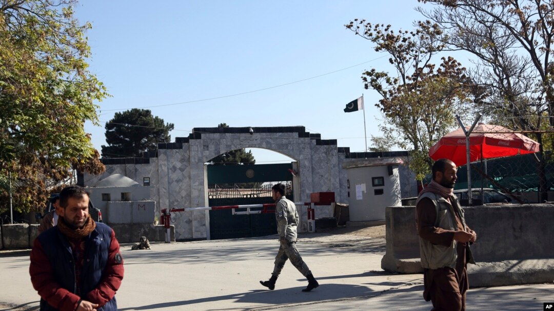 Security walks in front of the Pakistan Embassy in Kabul, Afghanistan, Nov. 4, 2019.