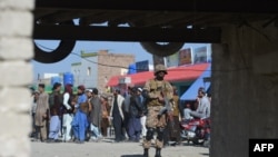 FILE - A Pakistani army soldier stands guard at a market in Miran Shah, a town in North Waziristan, near the border between Pakistan and Afghanistan, Jan. 27, 2019.