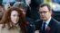 FILE - Former News of the World editor Rebekah Brooks and husband Charlie Brooks, left image, and former News of the World editor Andy Coulson arrive at The Old Bailey law court in London. 