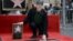 Ron Howard touches his star on the Hollywood Walk of Fame after being honored with the 2,568th star in Los Angeles, California, Dec. 10, 2015. 