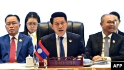 Laos' Foreign Minister Saleumxay Kommasith, center, speaks during the 57th Association of southeast Asian Nations (ASEAN) Foreign Ministers' plenary session meeting in Vientiane on July 25, 2024.