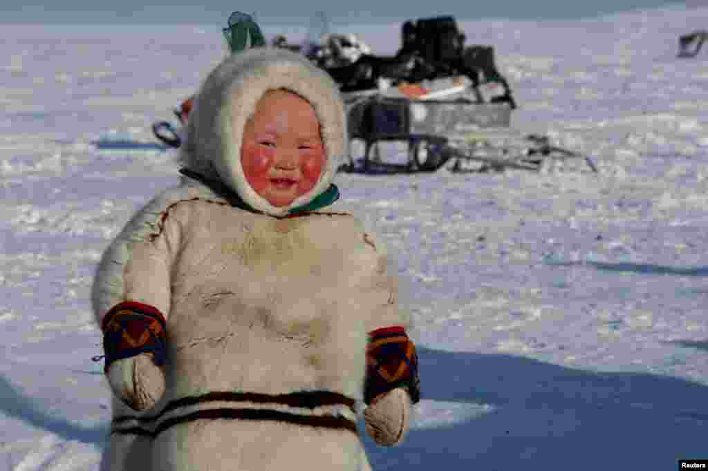 A child from the indigenous community &quot;Yamb To&quot; (Long Lake) is seen at a reindeer camping ground, about 450 km northeast of Naryan-Mar, in Nenets Autonomous District, Russia.