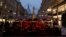 FILE - People sit in a cafe amidst the coronavirus disease (COVID-19) outbreak, in Vienna, Austria, Nov. 12, 2021. 