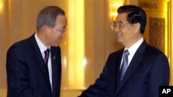 U.N. Secretary-General Ban Ki-moon, left, shakes hands with China's President Hu Jintao during their meeting in the Great Hall of the People in Beijing on Monday, 1 Nov 2010